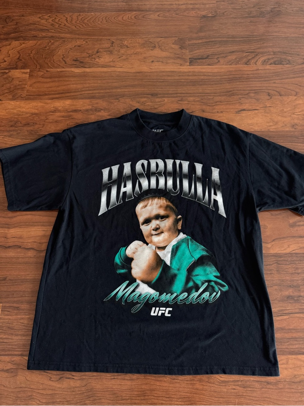 UFC Black Tee with Green and Skin-Tone Hasbulla Graphic